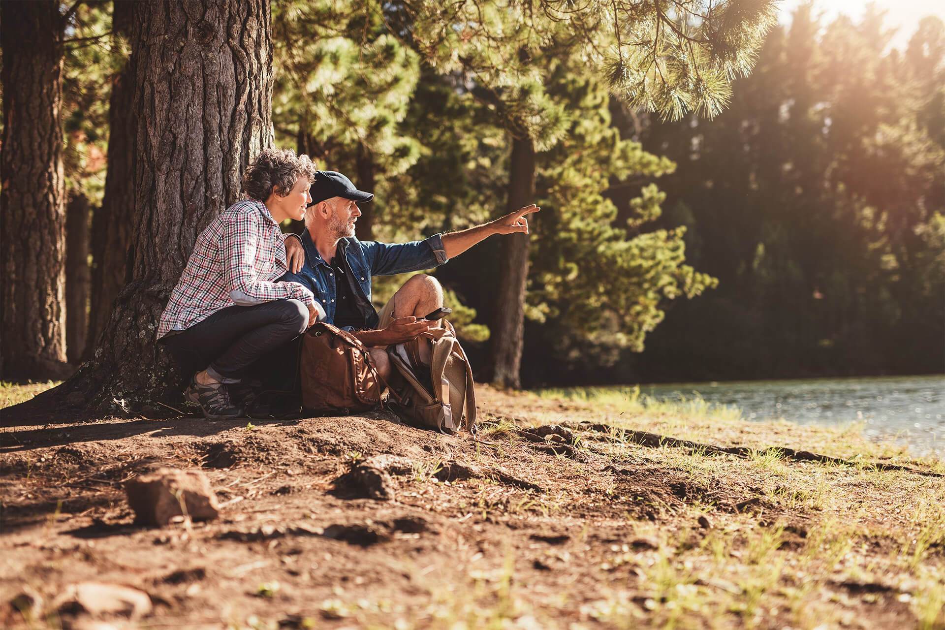 Senior man and woman on a hike in nature